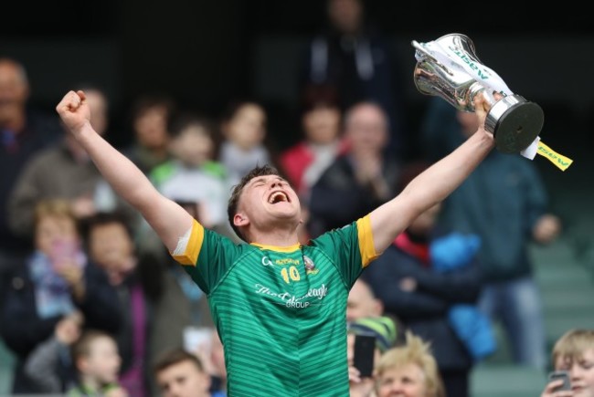 Dara Moynihan of St. Brendan's lifts the cup