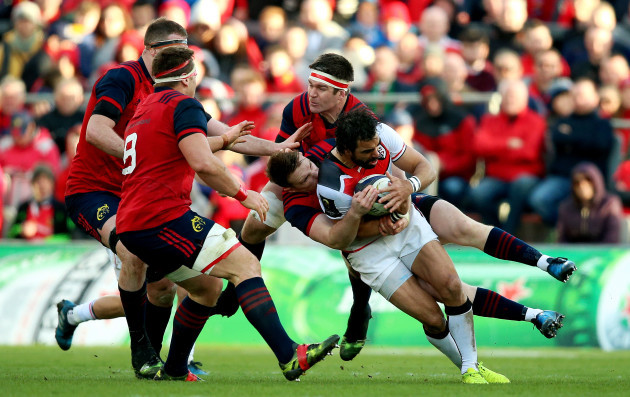 Yoann Huget is tackled by Billy Holland and Rory Scannell