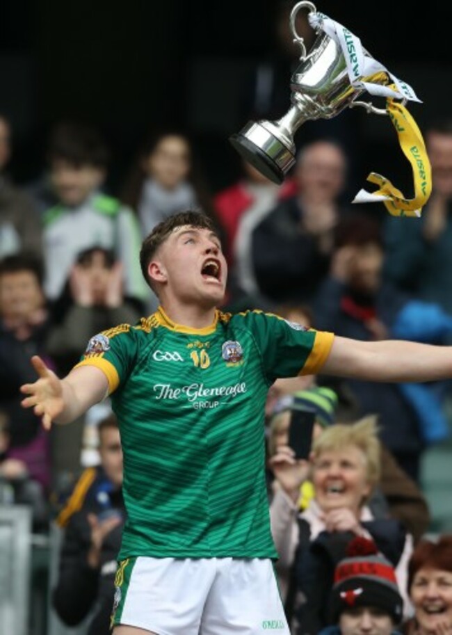 Dara Moynihan of St. Brendan's lifts the cup
