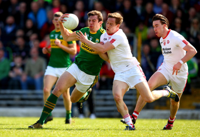 David Moran is tackled by Kieran McGeary