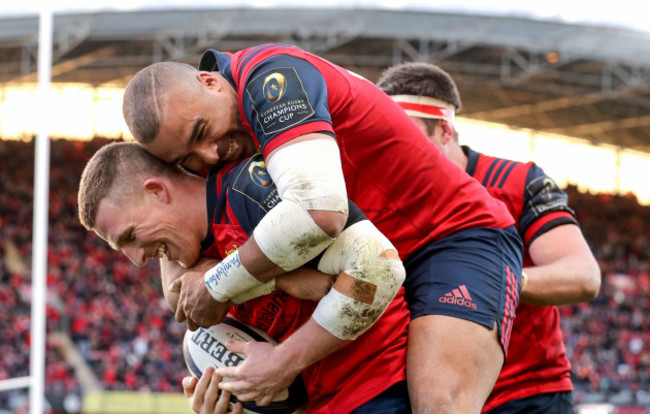 Andrew Conway celebrates his try with Simon Zebo