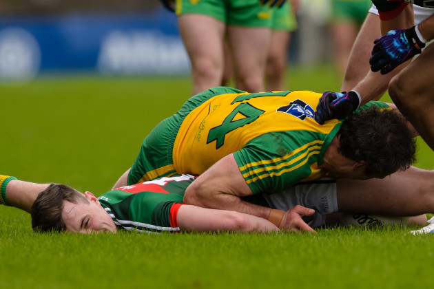 Diarmuid OÕConnor after a tackle from Michael Murphy