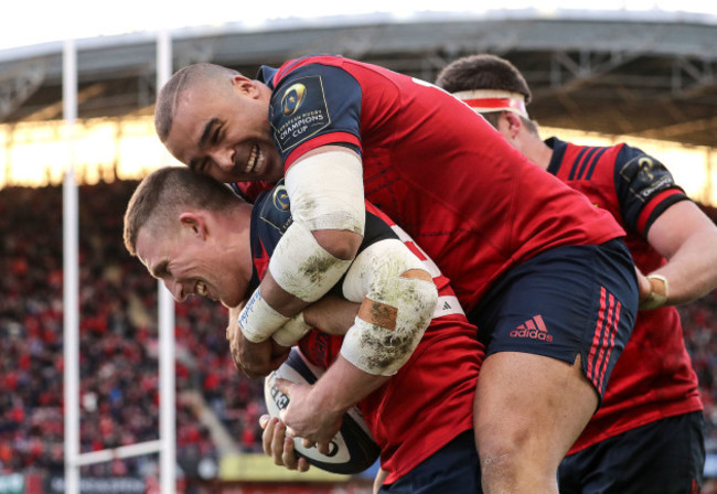 Andrew Conway celebrates his try with Simon Zebo