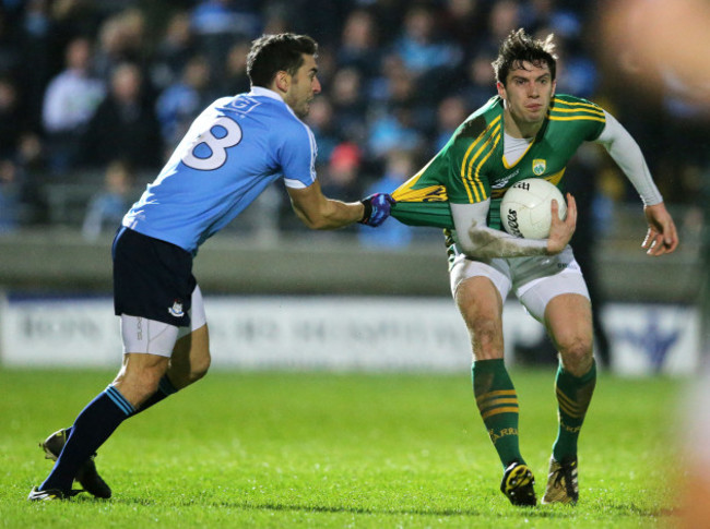 David Moran is tackled by Bernrad Brogan