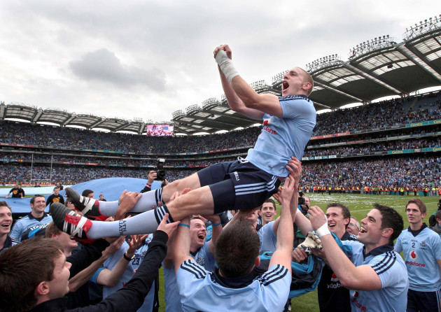 Eoghan O'Gara lifted up during the celebrations
