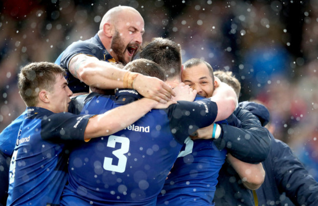 Jack Conan celebrates scoring a try with his teammates