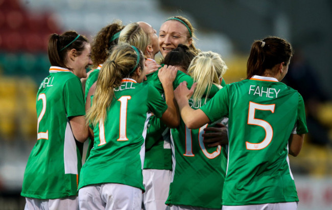 Stephanie Roche celebrates scoring a goal with teammates