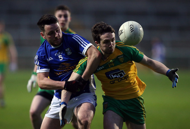 Donegal's Cian Mulligan with Shan O’Connor of Cavan