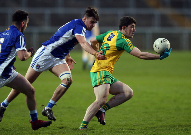 Donegal's Stephen McBrearty with Cormac Daly of Cavan