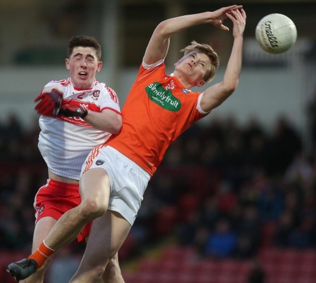 Armagh's Ryan O'Neill and Conor McGrogan of Derry