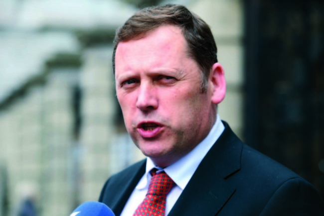 Fianna F&aacute;il TD Barry Cowen  accuses Simon Coveney of spin as water charge row escalates