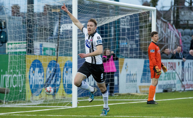 David McMillan celebrates scoring the first goal