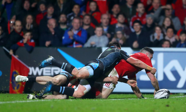 Ronan O’Mahony is unable to ground the ball under pressure from Ali Price and Tommy Seymour