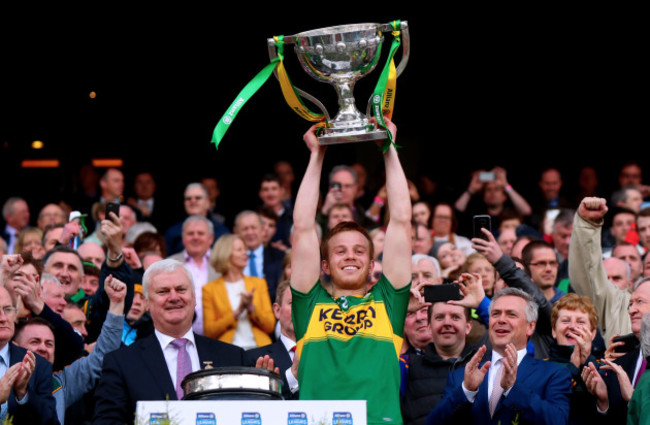 Fionn Fitzgerald lifts the trophy