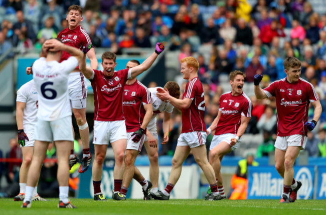 Thomas Flynn, Gareth Bradshaw, Cathal Sweeney, Declan Kyle, Gary O'Donnell and David Wynne celebrate at the final whistle