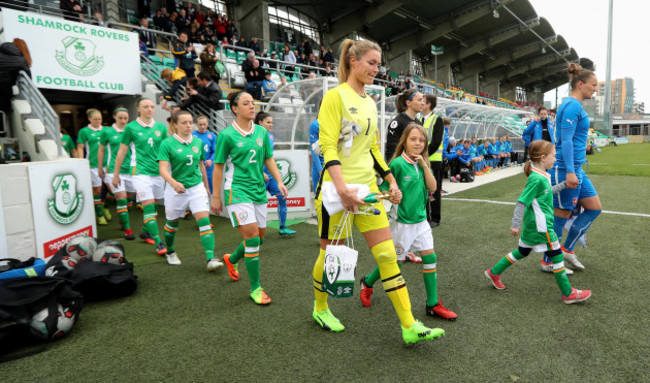 Emma Byrne leads out her team