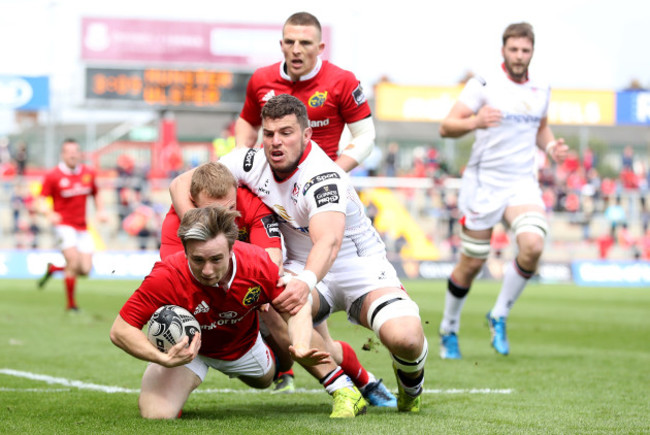 Angus Lloyd scores a try despite Sean Reidy