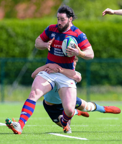 Mick McGrath is tackled by Rob Byrne