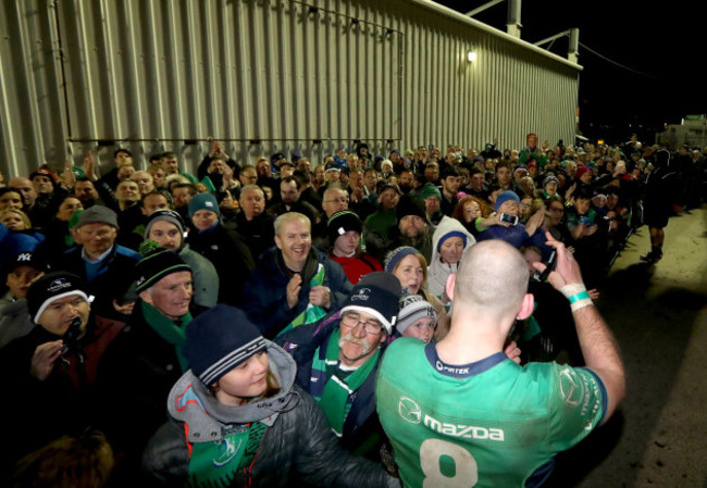 John Muldoon with fans after the game