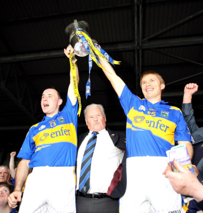 Joint captains Eoin Kelly and Paul Ormond lift the cup together