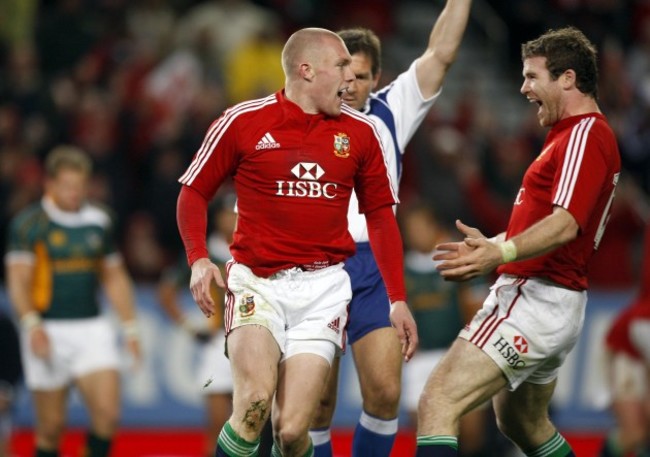 Keith Earls celebrates scoring his try with Gordon D'Arcy