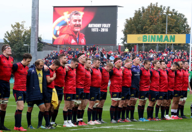 Munster players observe a minutes silence for their late Head Coach Anthony Foley