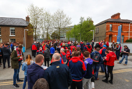 Fans make their way into the stadium