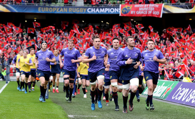 The Munster team make their way into the dressing room after their warm up