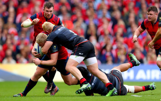 John Ryan tackled by Vincent Koch and Mako Vunipola