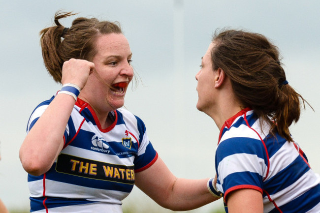 Carmela Morey scores a try and celebrates with Carrieann Hanley