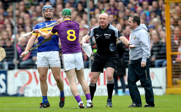 Davy Fitzgerald and Aidan Nolan clash with Jason Forde