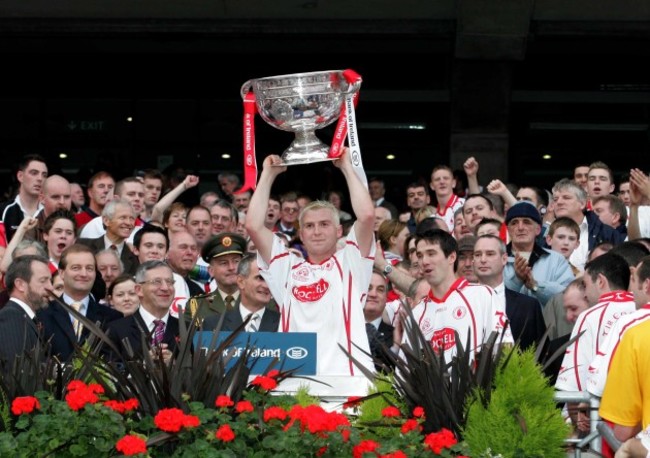 Owen Mulligan lifts the Sam Maguire