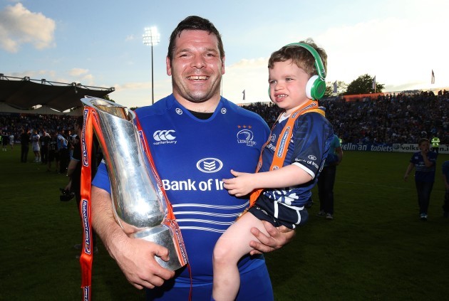Mike Ross Celebrates with the RaboDirect PRO12 Trophy and his son Kevin