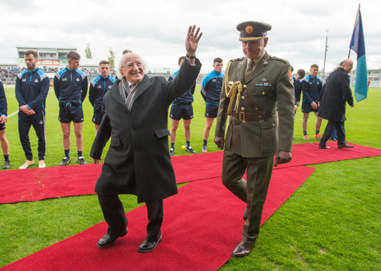 Michael D Higgins attends the game