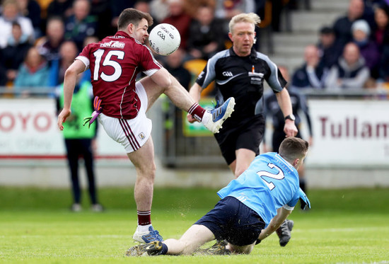 Dessie Connelly has a shot blocked by Darren Byrne