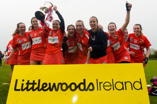 Cork's players celebrate winning the league