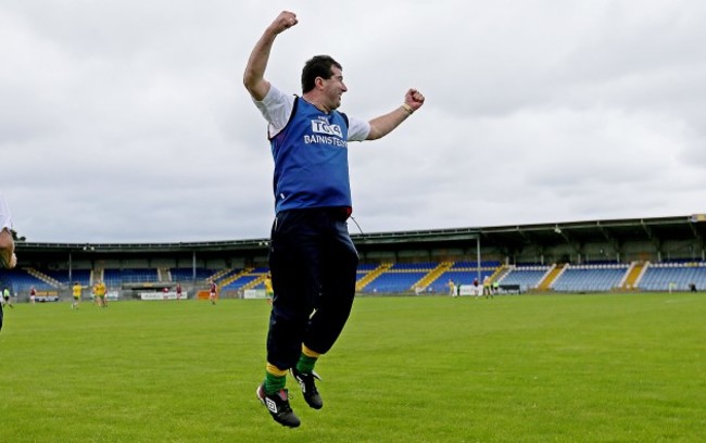 Michael Naughton celebrates at the final whistle