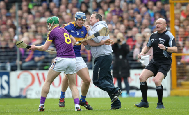 Davy Fitzgerald and Aidan Nolan clash with Jason Forde