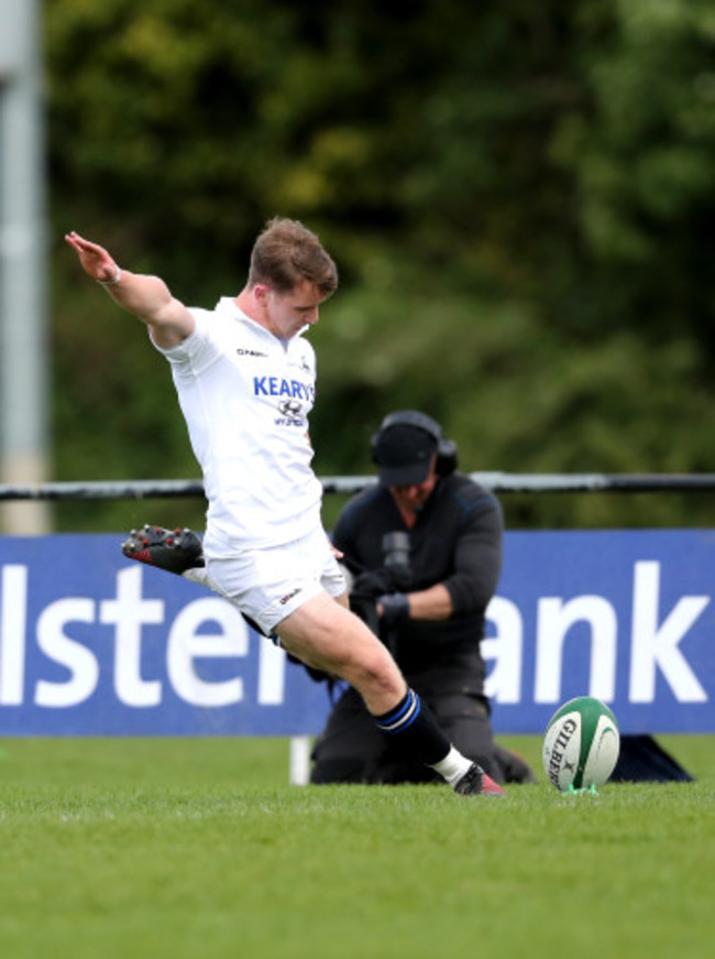 Tomas Quinlan kicks a conversion