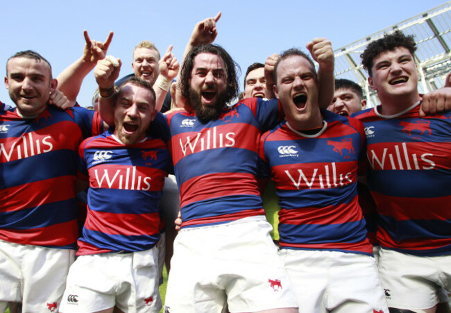 Clontarf players celebrate winning