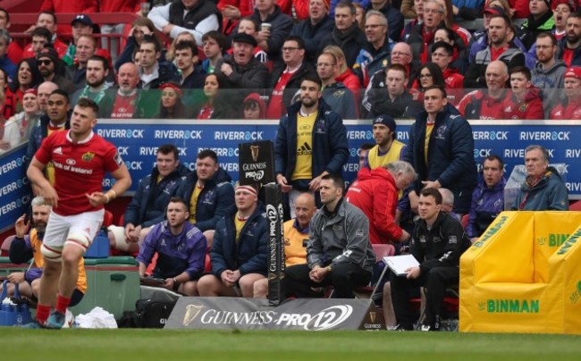 MunsterÕs Conor Murray looks on from the bench