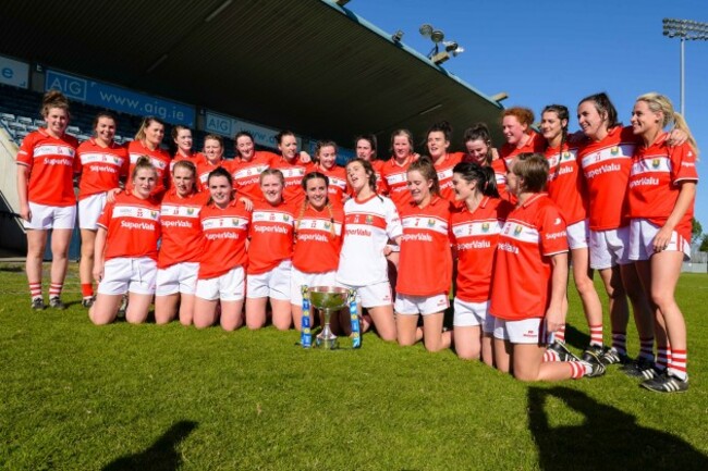 Cork celebrate with the league trophy