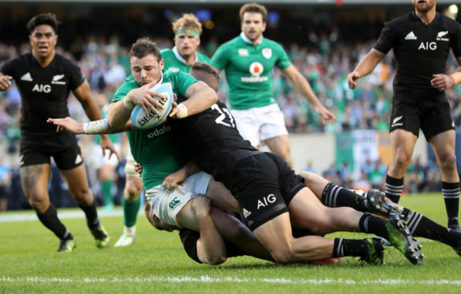 Ireland’s  Robbie Henshaw scores a try