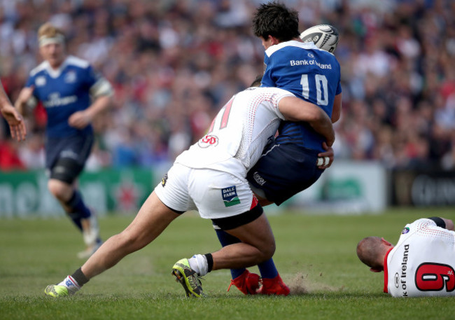 Joey Carbery tackled by Charles Piutau