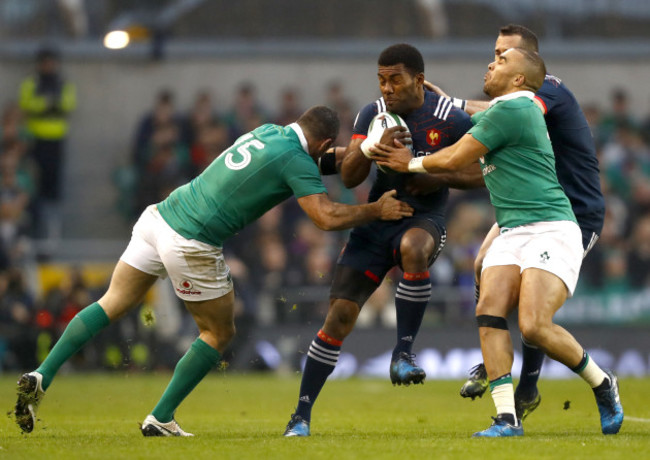 Noa Nakaitaci is tackled by Rob Kearney and Simon Zebo