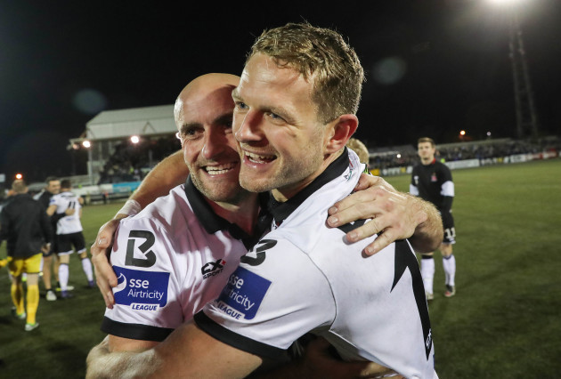 Alan Keane and Dane Massey celebrate after the game