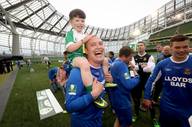 Anthony Kavanagh celebrates with his son Carter