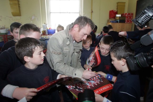 Trevor Molloy signs autographs