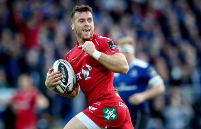 Gareth Davies celebrates on his way to scoring their third try