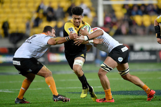 Ardie Savea tackled by Johan Coetzee and Oupa Mohoje